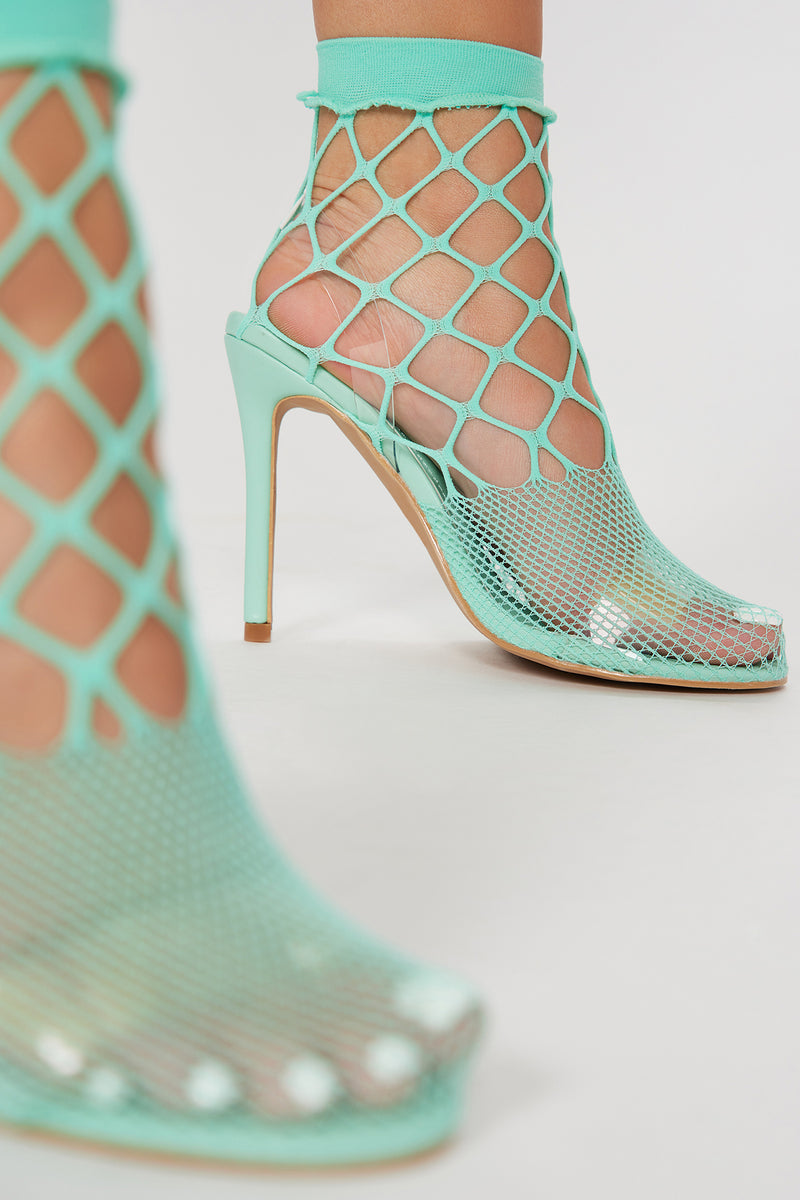 Neon fishnet heels store