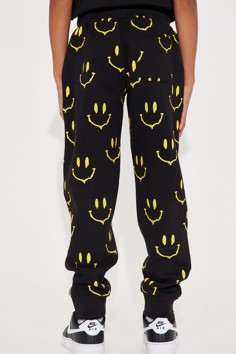 Nike smiley face pants store
