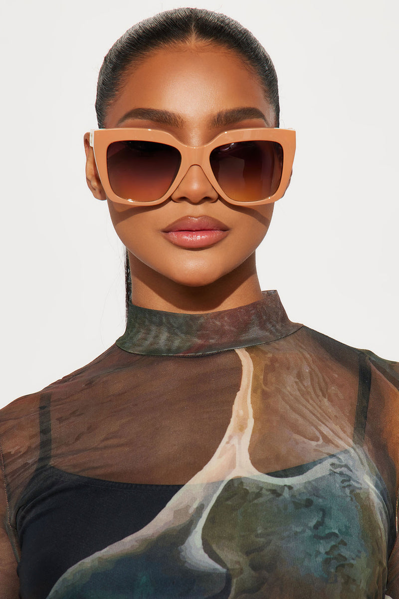 Tan through sunglasses store