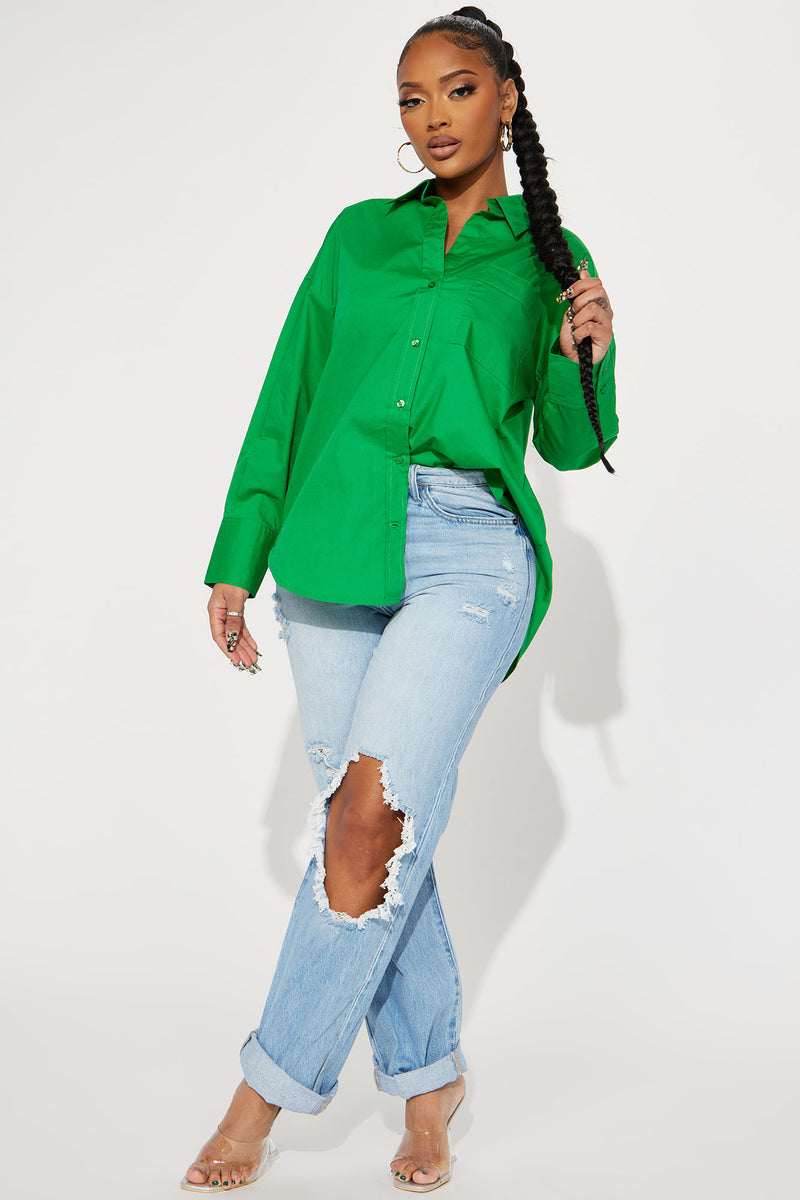 Green blouse with store jeans
