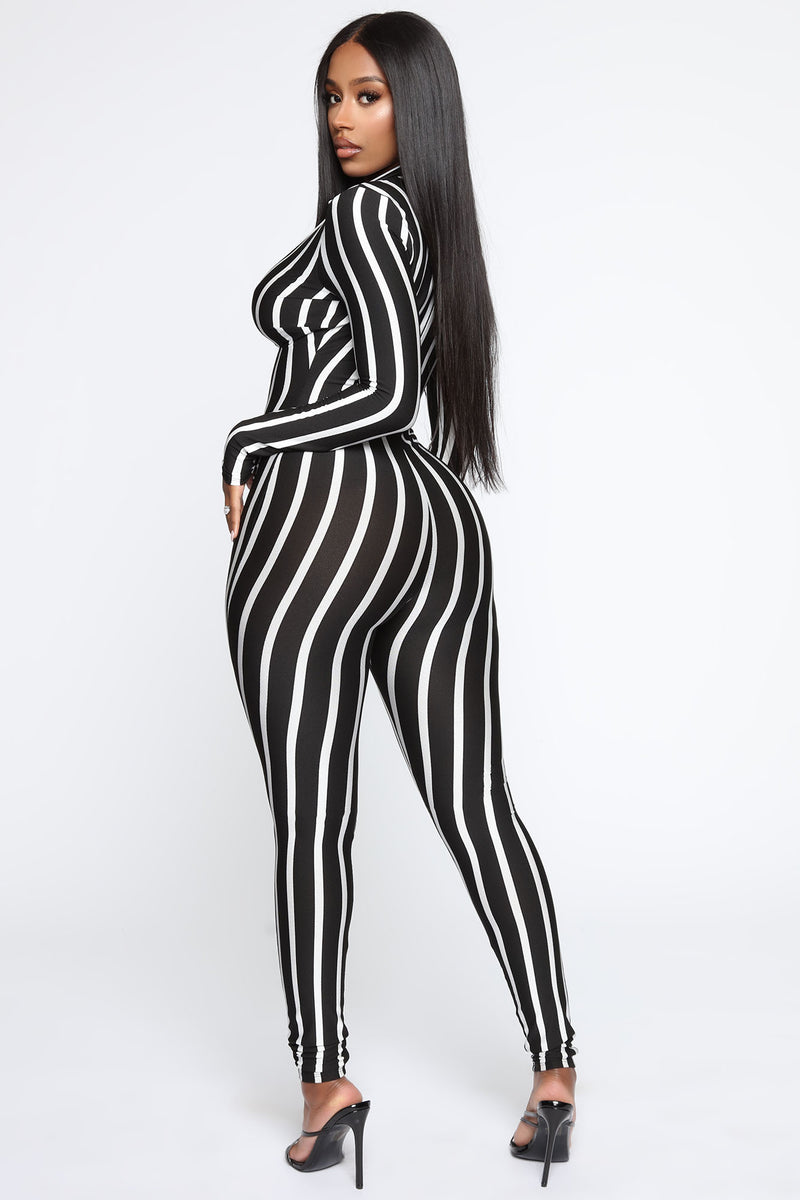 Fashion nova black deals and white striped jumpsuit