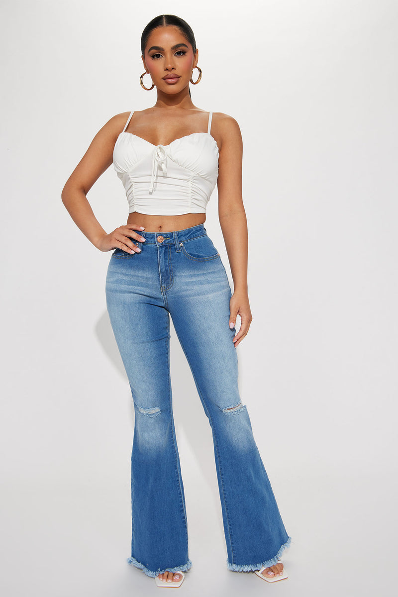 Petite Coming Your Way Ripped Flare Jean Medium Wash