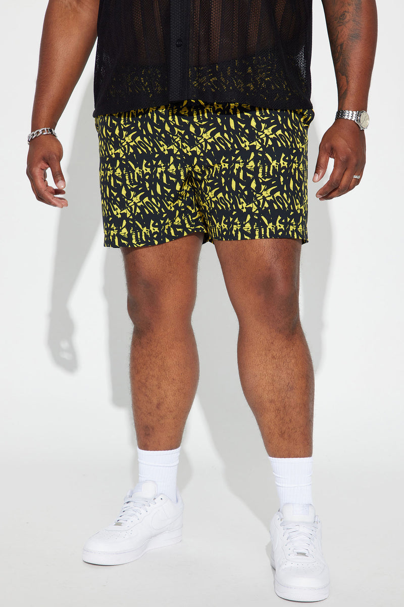Yellow and black best sale swim trunks