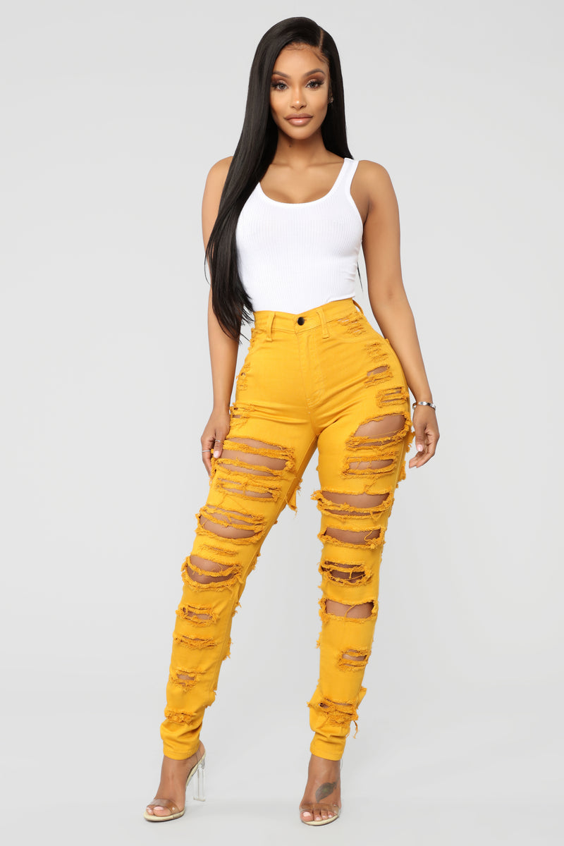 Mustard ripped jeans hotsell