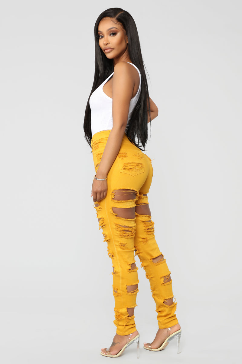 Mustard ripped top jeans