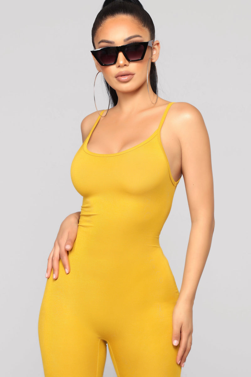 Yellow jumpsuit hot sale fashion nova