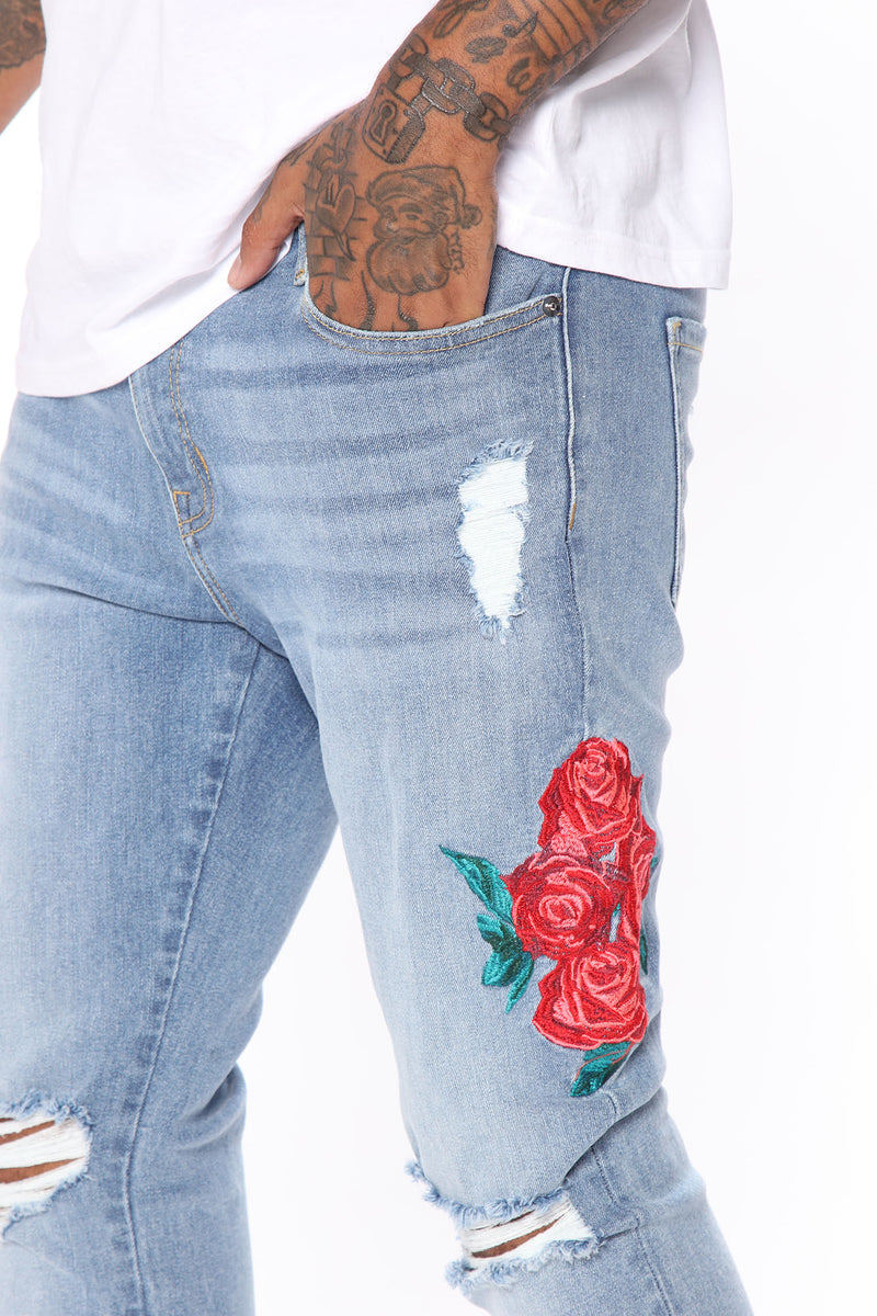 Mens rose embroidered jeans online