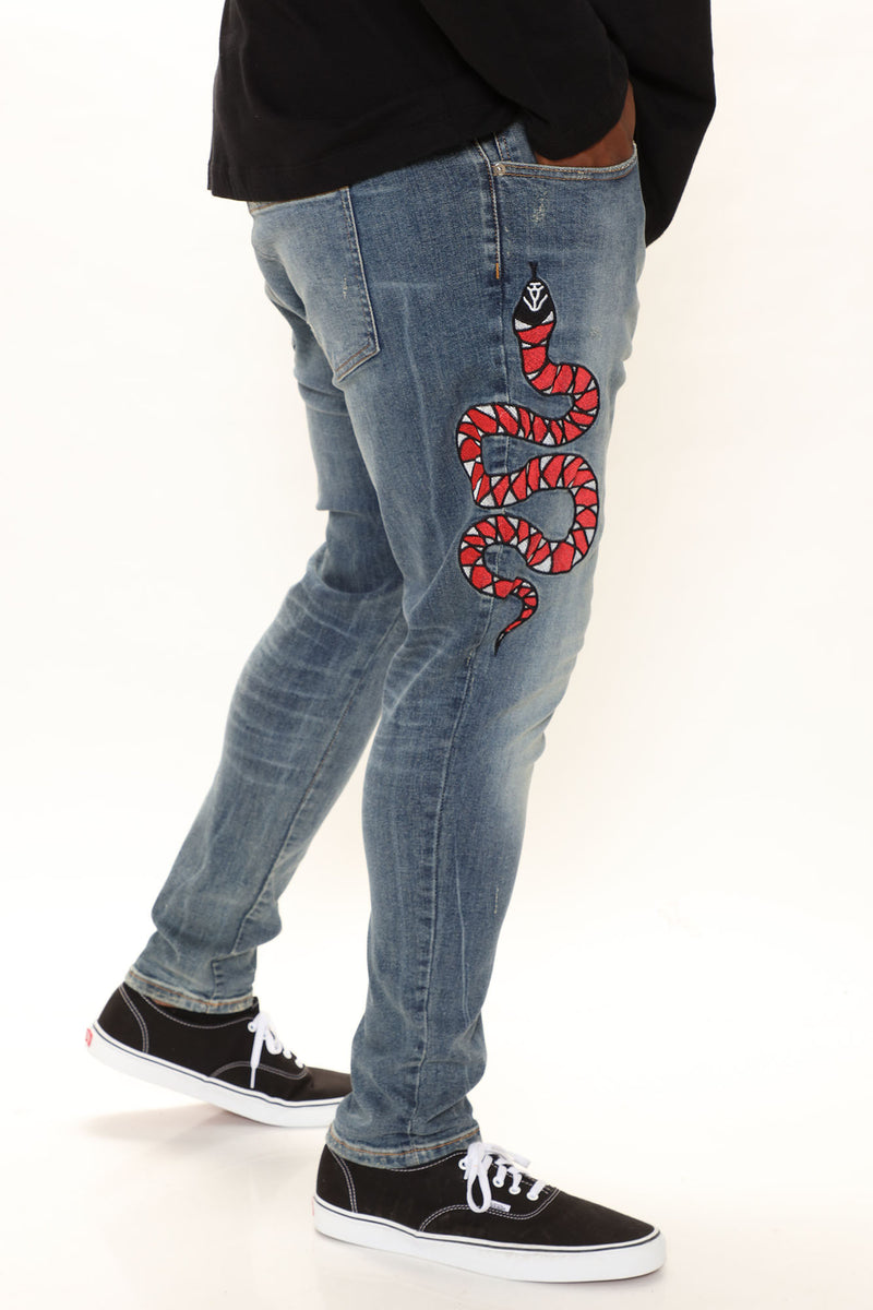Gucci snake 2025 jeans mens