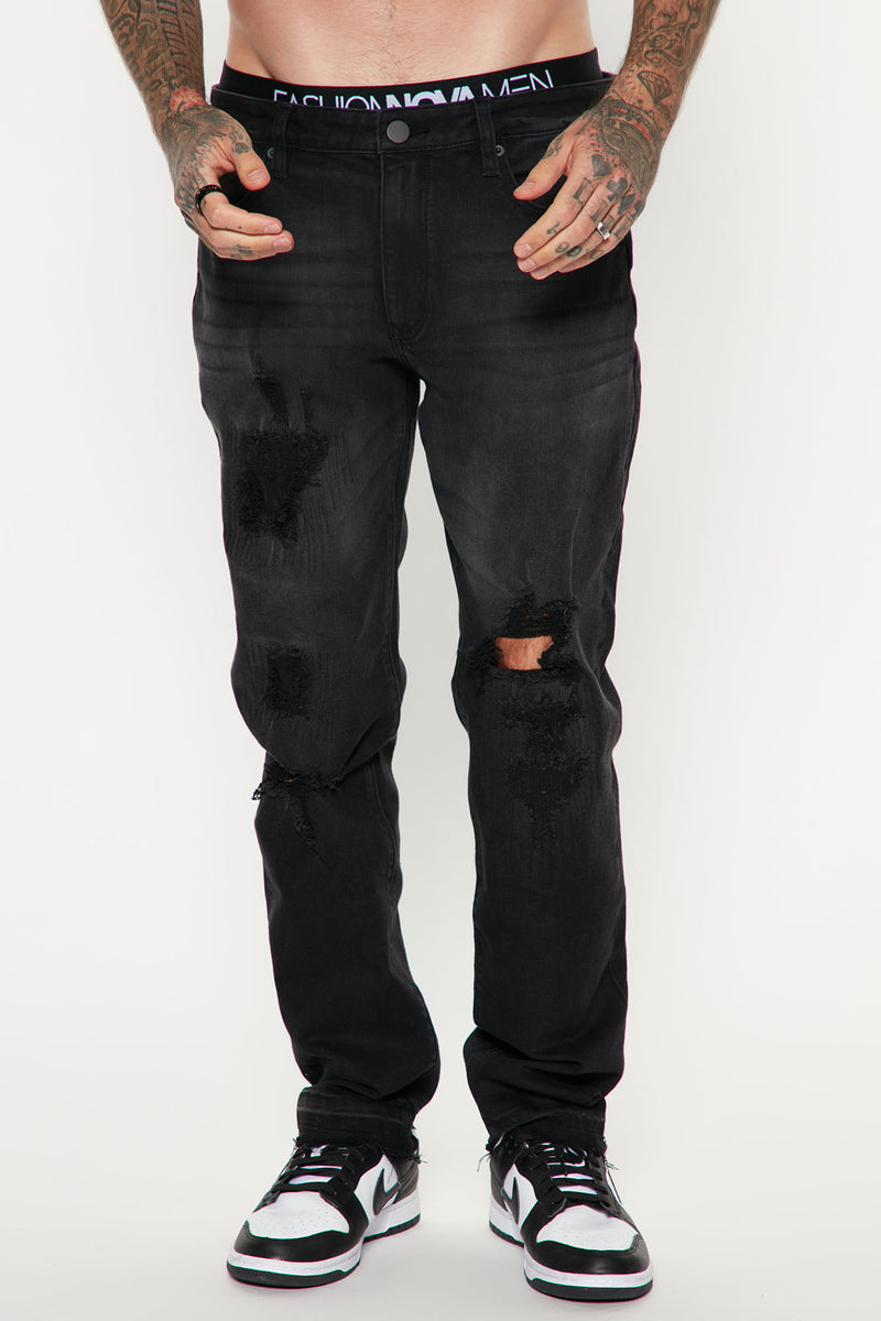 Black wash hot sale ripped jeans