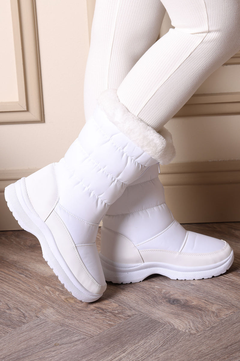 White fuzzy boots top