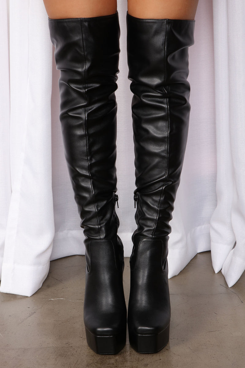 Black platform over top the knee boots