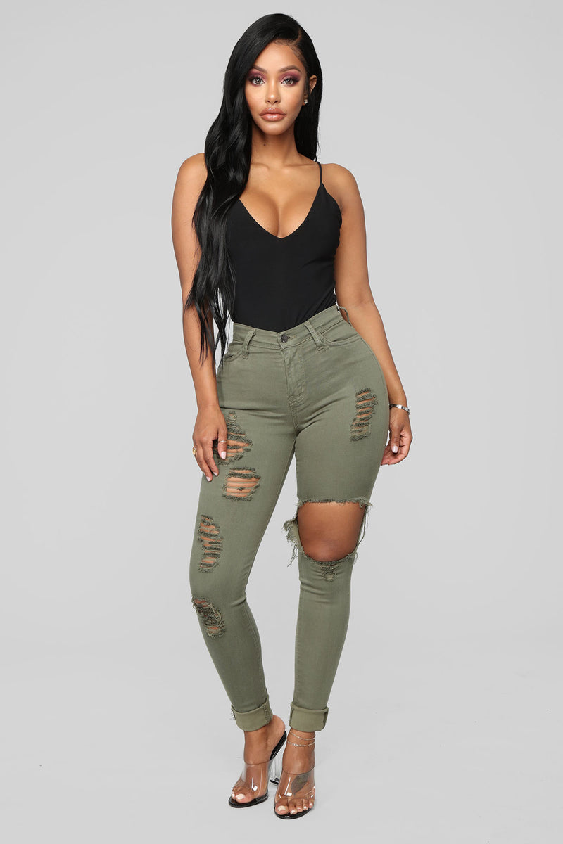 Olive shop ripped jeans
