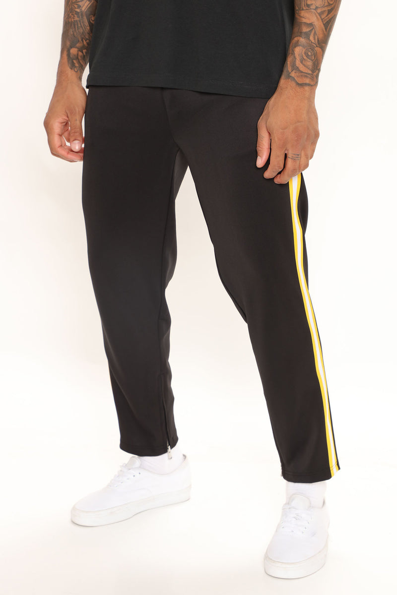 Black sweatpants hot sale with yellow stripe