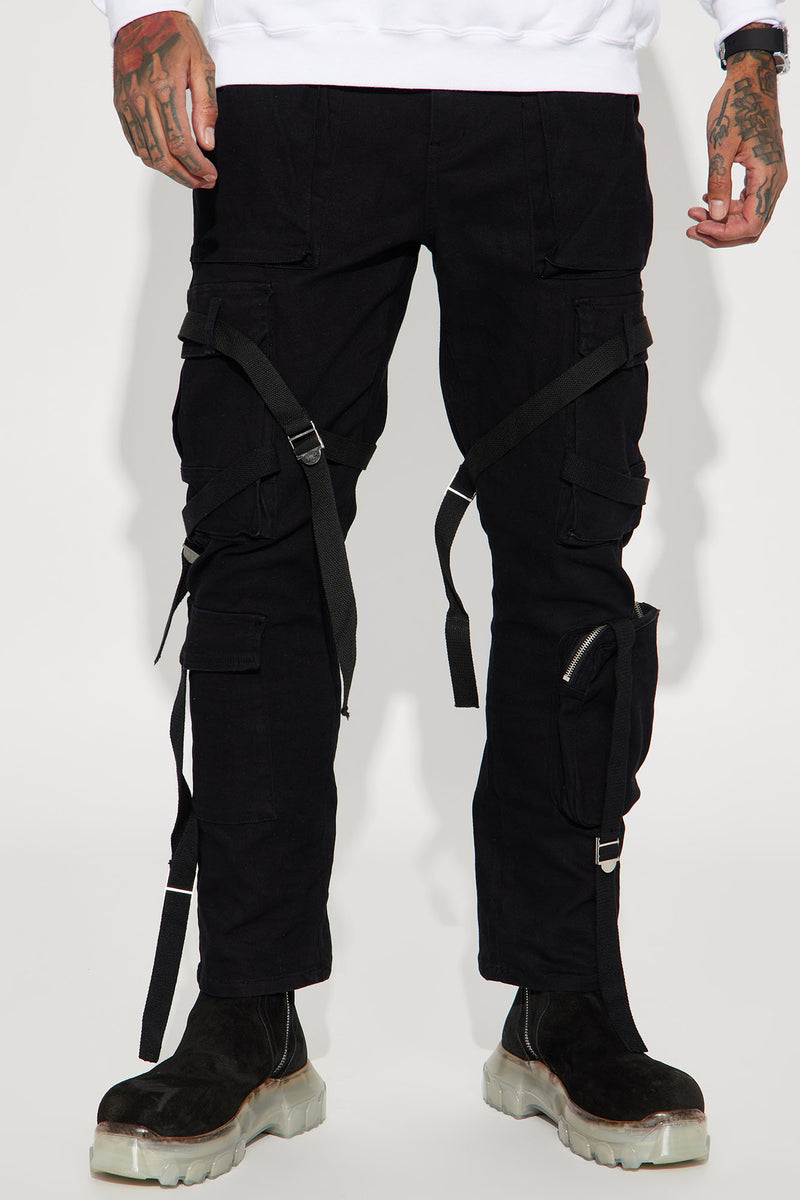 Jeans with hanging straps sales
