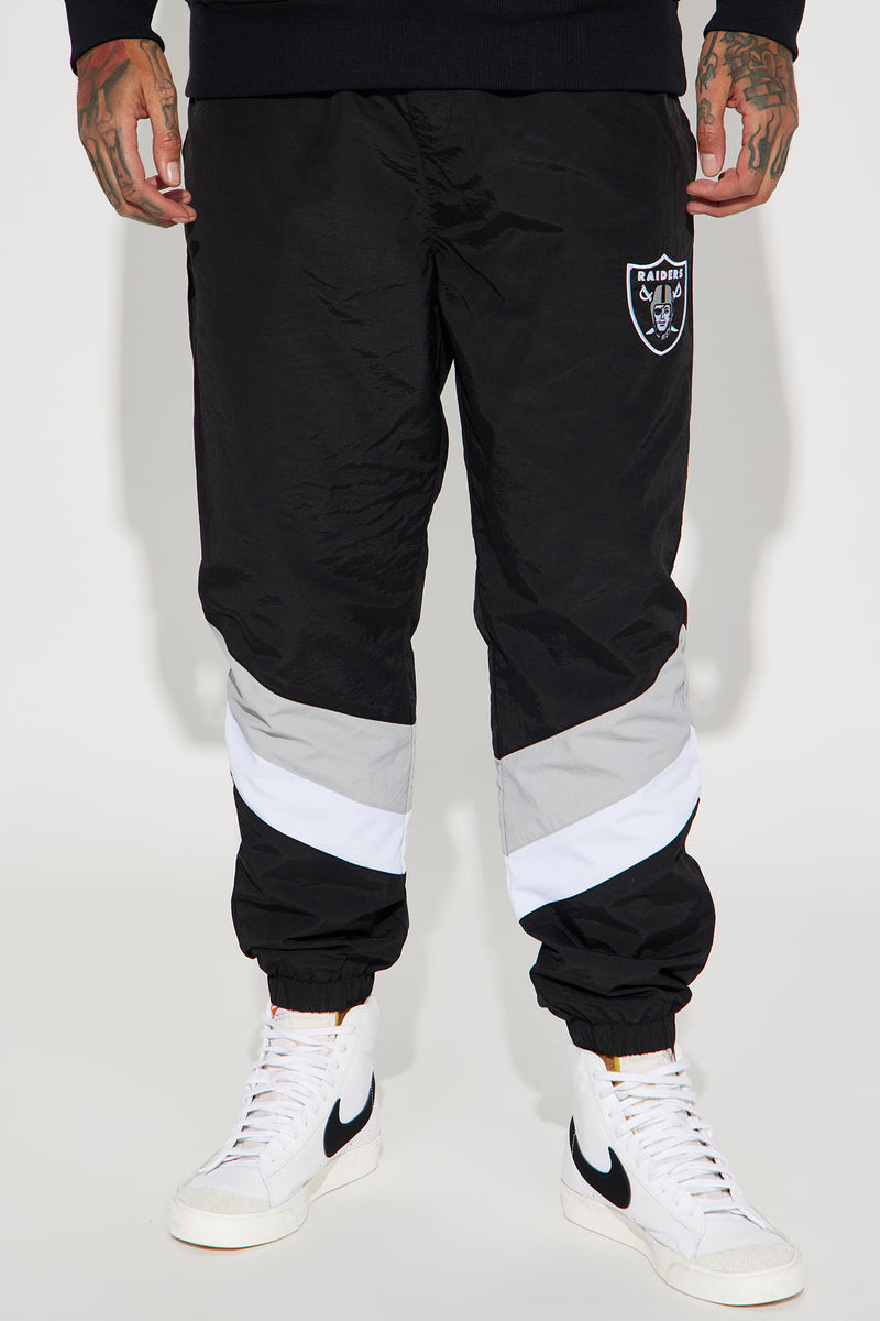 Raiders top track pants