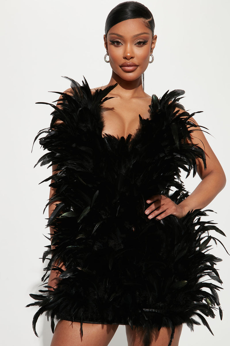 Little black shop dress with feathers