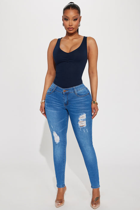 Ripped medium sale wash jeans