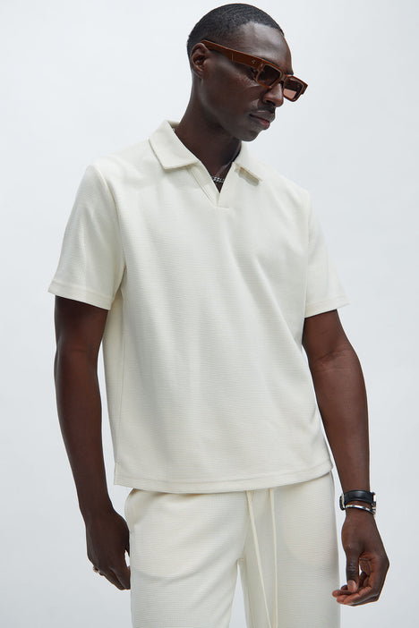 Cream polo shirt sales