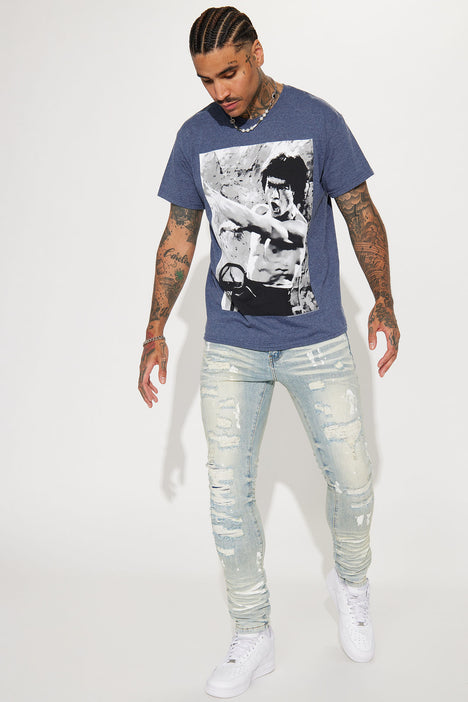 Medium super ripped paint discount spots sexy twist jeans