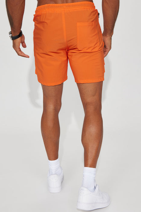 Mens neon hot sale orange shorts