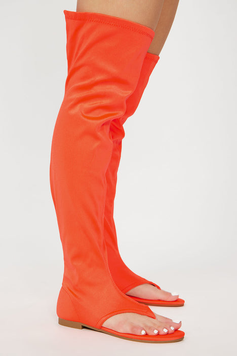 Burnt orange thigh high boots top