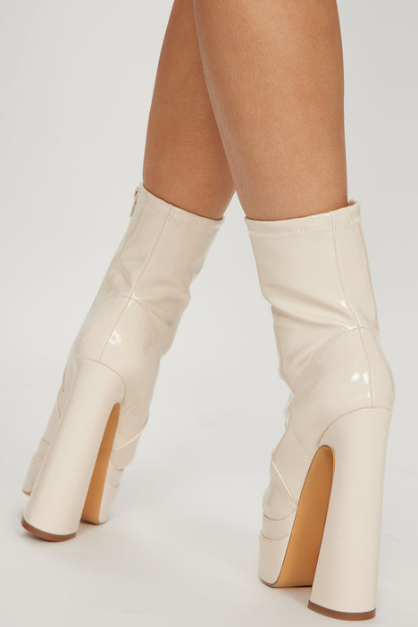 Cream online platform boots