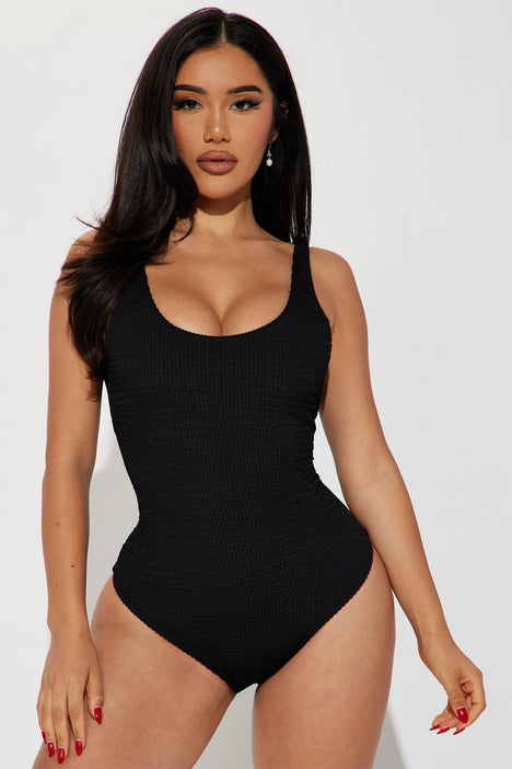 Black one piece fashion nova hot sale