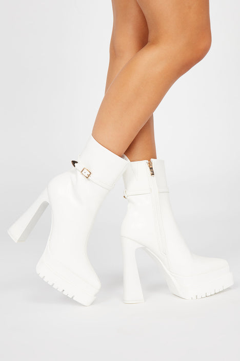 White shop platform booties