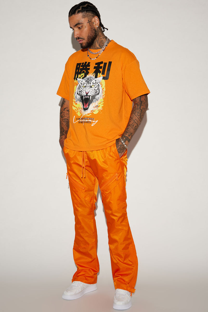 Play The Track Stacked Slim Flare Nylon Pants Orange Fashion Nova play-the-track-stacked-slim-flare-nylon-pants-orange-fashion-nova