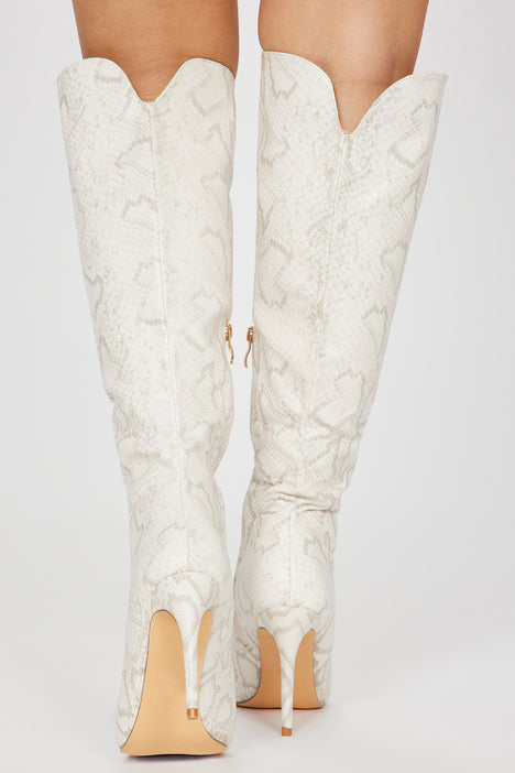 White snakeskin thigh high boots top