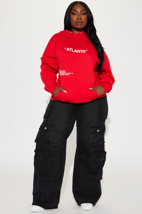 Red hoodie on sale and black pants