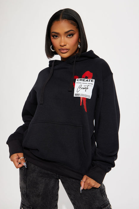 Black hoodie with red writing top