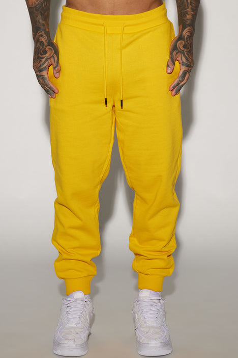 Yellow track on sale pants mens