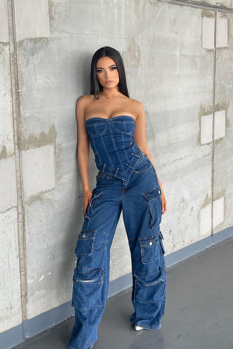 Fashion Nova is selling a £19.50 denim crop top with SLEEVES tied at the  front and shoppers are very confused | The Sun
