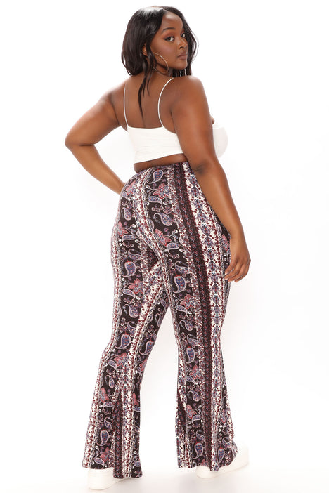 Urban Threads Plus flared pants in snake print  ASOS