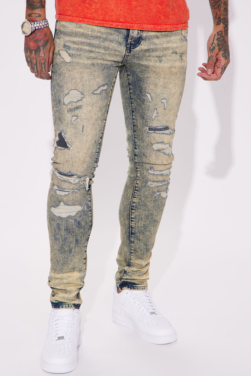 Patched Down Stacked Skinny Jeans - Vintage Blue Wash | Fashion Nova ...