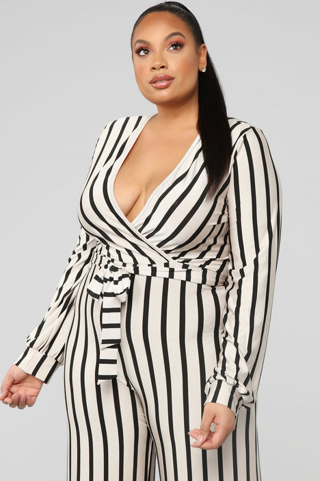 Fashion nova black deals and white striped jumpsuit