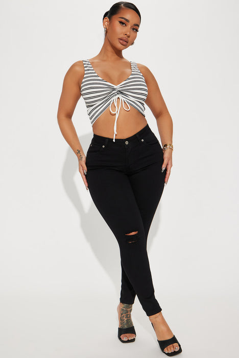 Caviar Mid Rise Ripped Ankle Skinny Jean Black