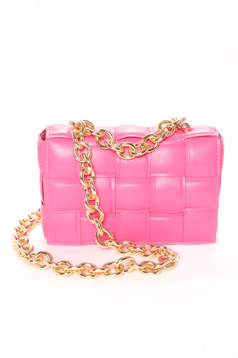 Neiman Marcus on X: An oversized chain strap, compact shape & irresistible  pop of pink make this @CHANEL handbag one you'll want to hold tight to all  season long. Find it in