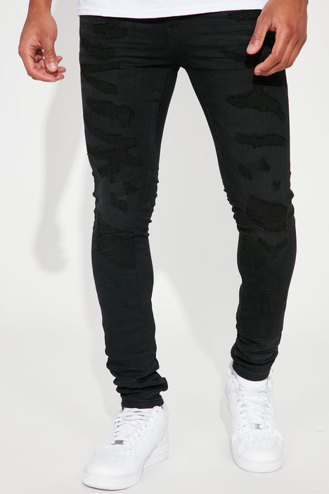 Never Fold Ripped Stacked Skinny Jeans Black