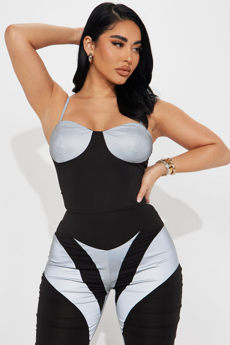 Black top reflective jumpsuit