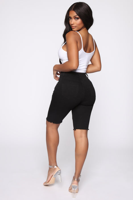 Black distressed bermuda shorts on sale
