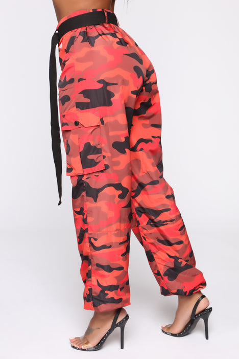 Orange camo 2025 pants fashion nova