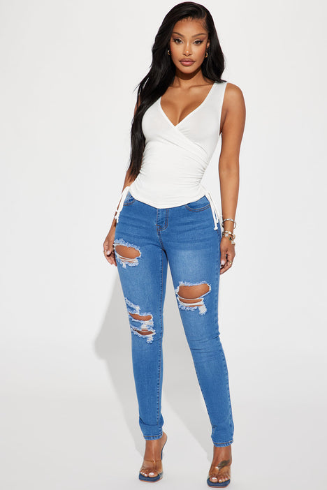 Ripped jeans women's fashion nova hot sale