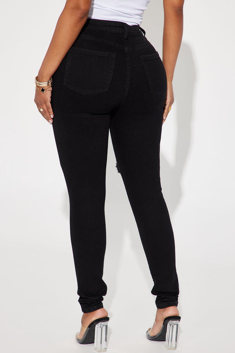 Black ripped jeans fashion nova top
