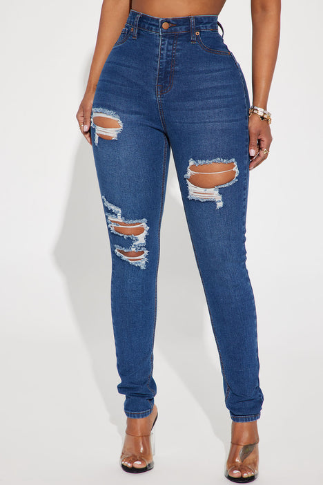 Ripped butt jeans fashion nova hotsell