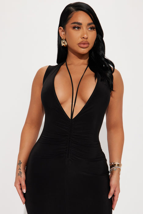 Plunging neckline deals black dress