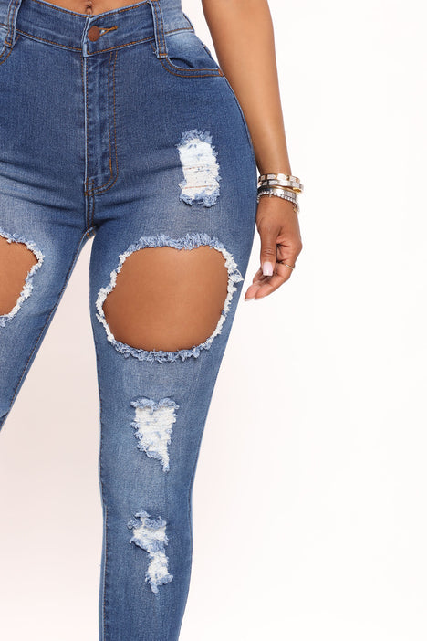 Blue ripped jeans fashion nova clearance