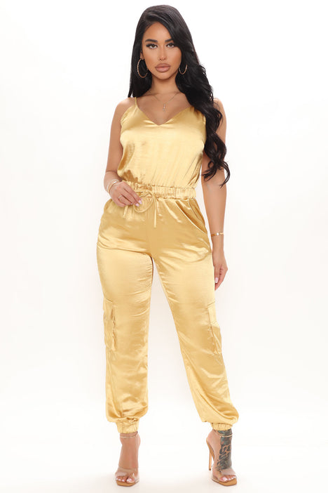 Gold jumpsuit fashion nova on sale