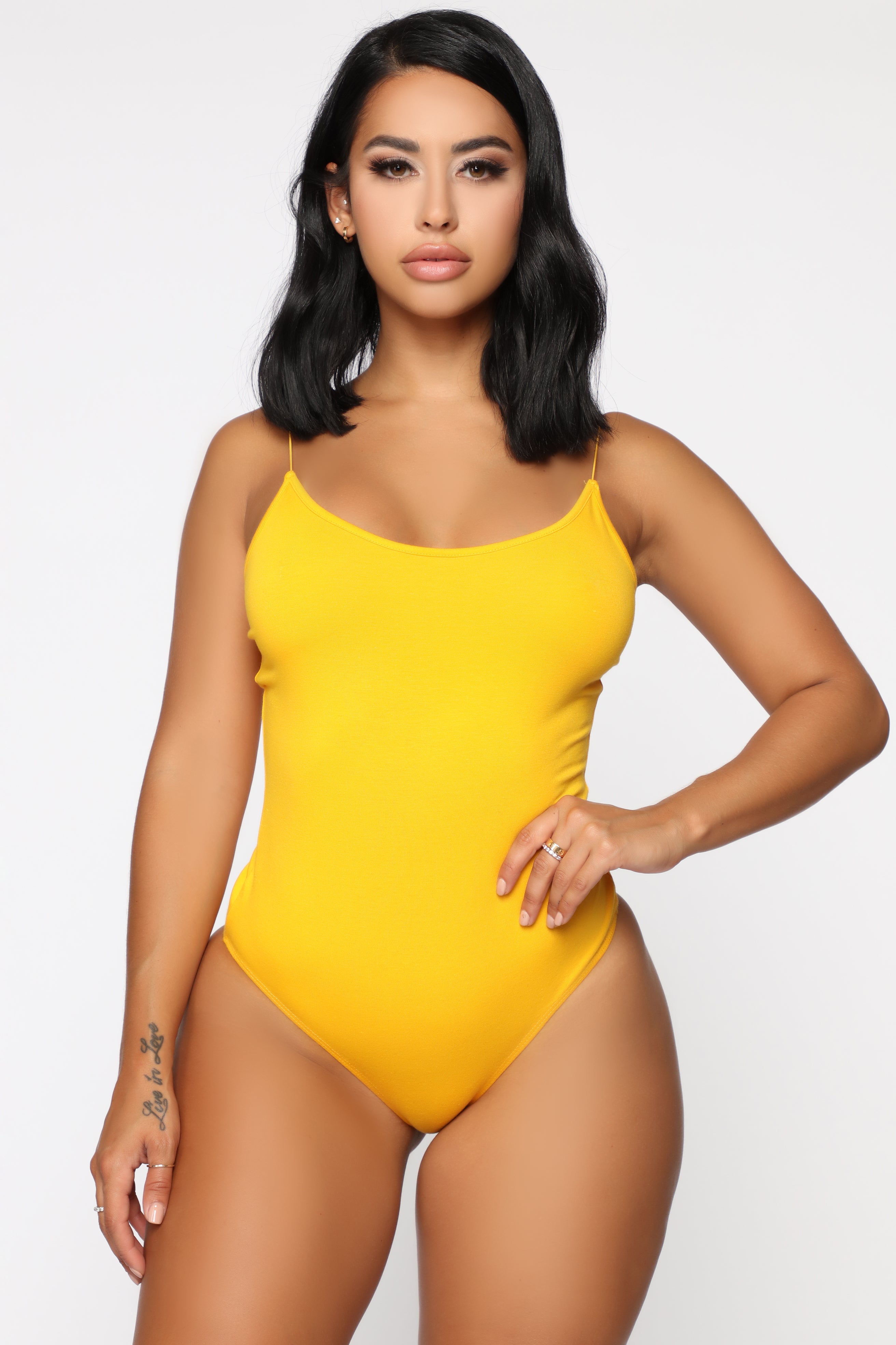 Yellow bodysuit on sale